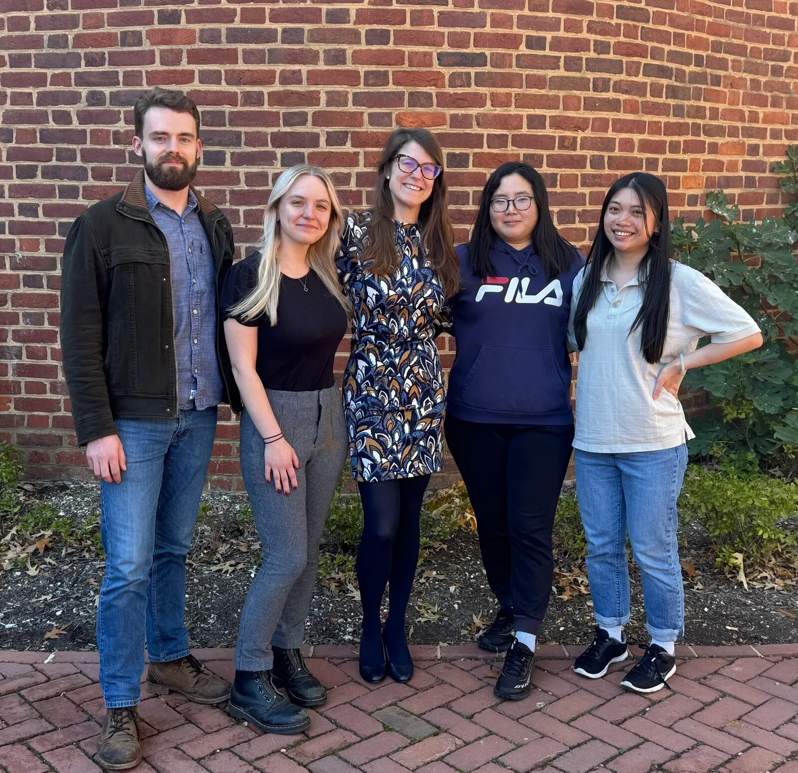 The Long Term Memory Lab group, photographed outdoors